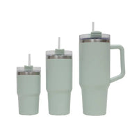 Set of three mint green insulated tumblers with straws on a white background