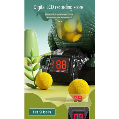 Toy dinosaur with digital LCD screen and yellow balls on a green background