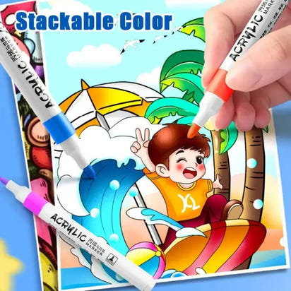 Coloring book with a child at the beach and acrylic markers being used to color it.