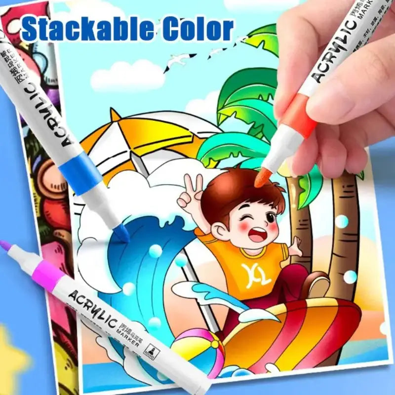 Coloring book with a child at the beach and acrylic markers being used to color it.