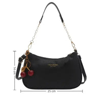 Black handbag with cherry charm and measurement details on a white background