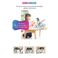Child learning English alphabet with a robot toy on a table.