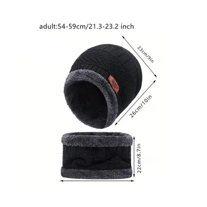 Black knitted beanie with gray interior and measurements on a white background