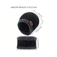 Black knitted beanie with gray interior and measurements on a white background