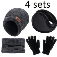 Set of winter accessories including a beanie, ear muffs, scarf, and gloves on a white background.