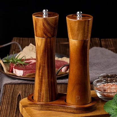 Wooden salt and pepper grinders.