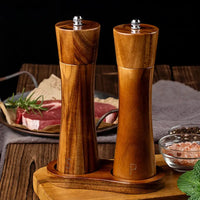 Wooden salt and pepper grinders.