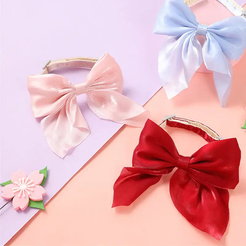 Satin bow pet collars.