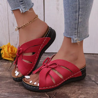 Red cut-out sandals.