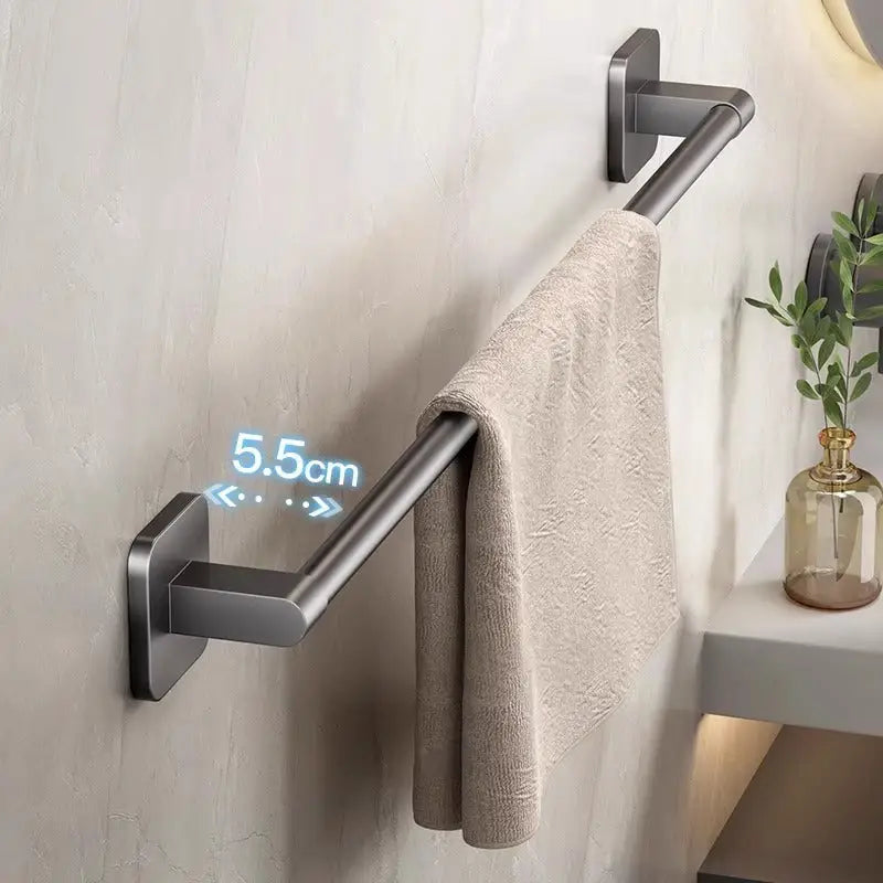 Gray metal towel bar.