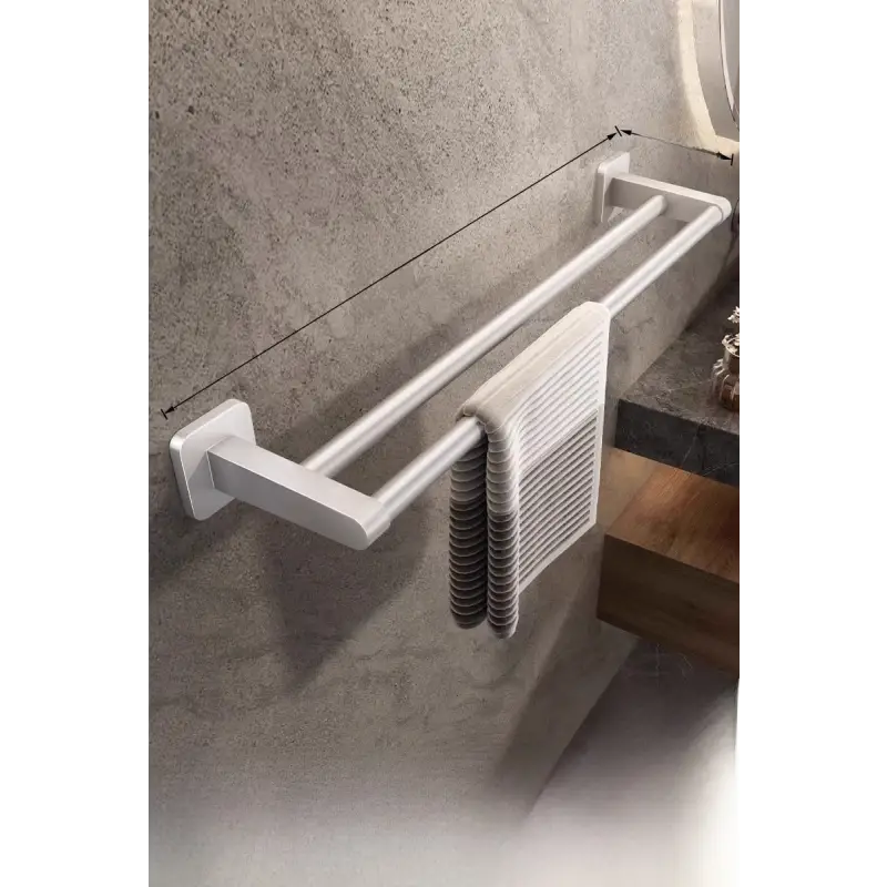 Double towel bar with towel.