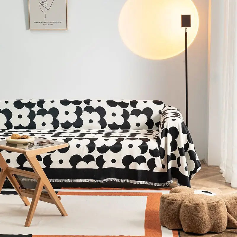 Black and white floral sofa throw.