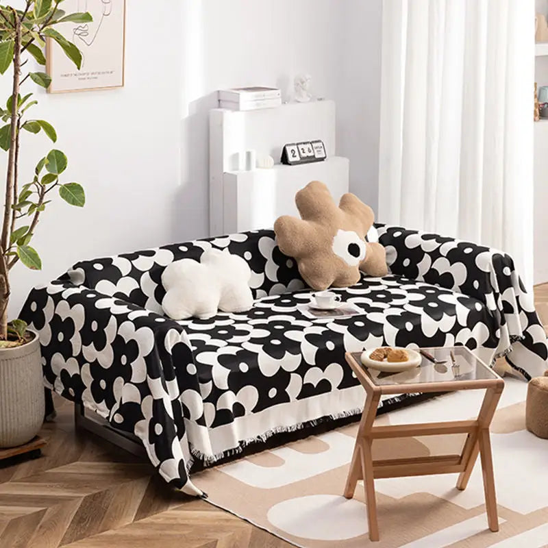 Black and white floral sofa throw.