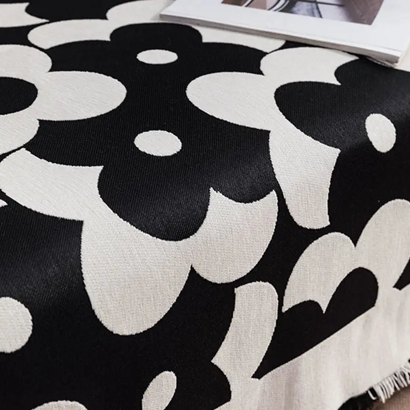 Black and white floral throw blanket.