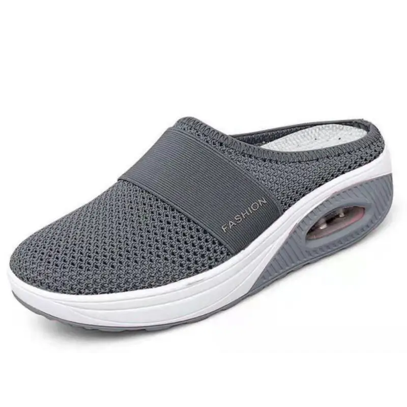 Gray mesh slip-on shoe with white sole.
