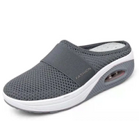 Gray mesh slip-on shoe with white sole.