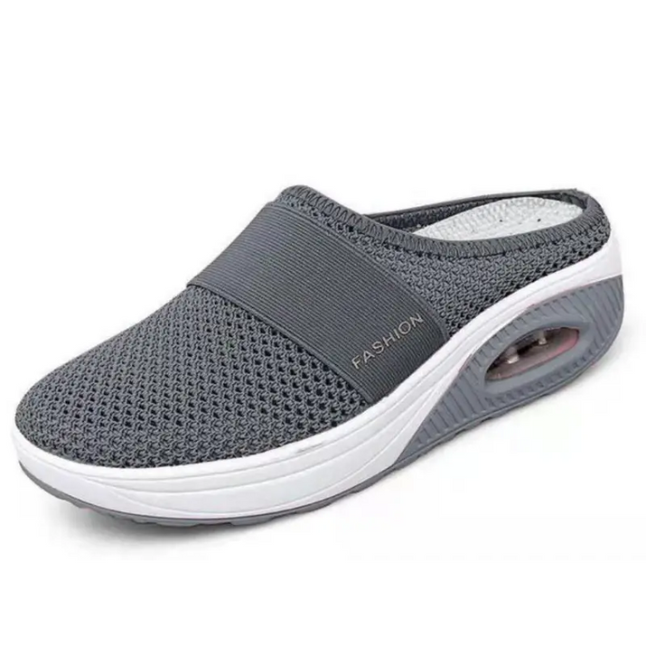 Gray mesh slip-on shoe with white sole.