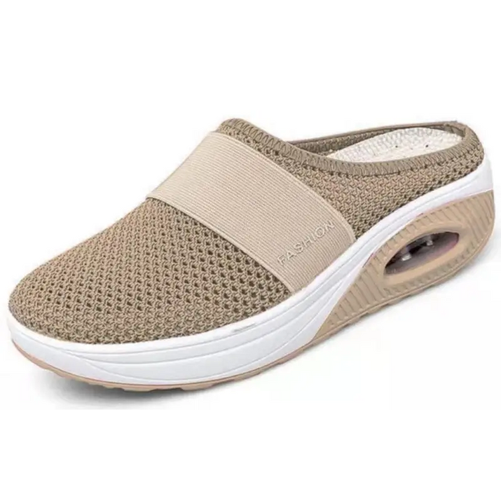 Beige mesh slip-on shoe with air cushion.