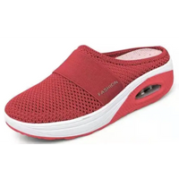 Red mesh slip-on shoe with white sole.