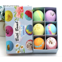 Boxed set of colorful bath bombs.