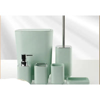 Mint green bathroom accessory set.