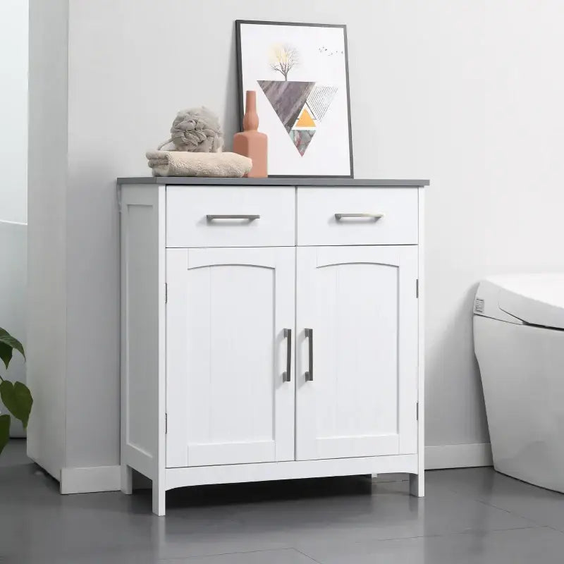 White bathroom cabinet with drawers and doors.
