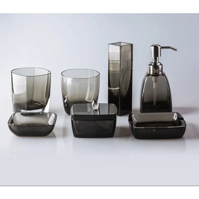 Smoked glass bathroom accessory set.