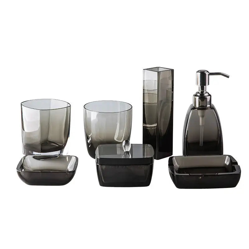 Smoked glass bathroom accessory set.