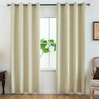 Beige grommet curtains.