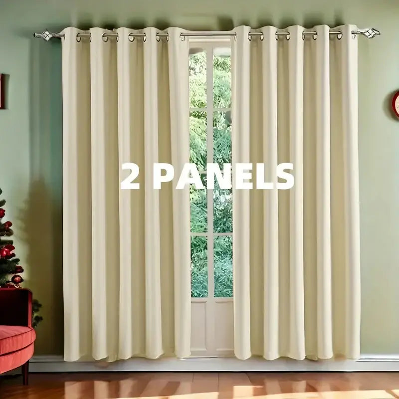 Two cream-colored curtain panels.