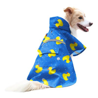 Dog wearing a blue ducky raincoat.