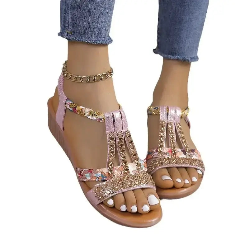 Pink floral embellished sandals.