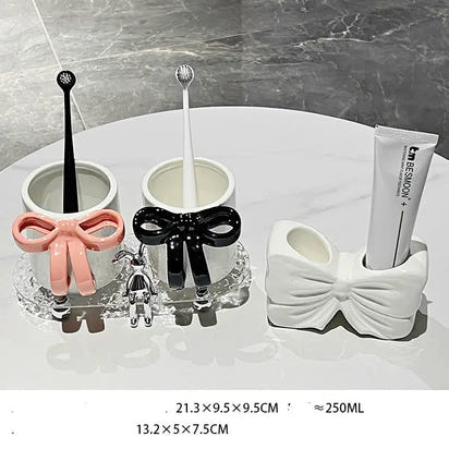 Bathroom set with bow accents.