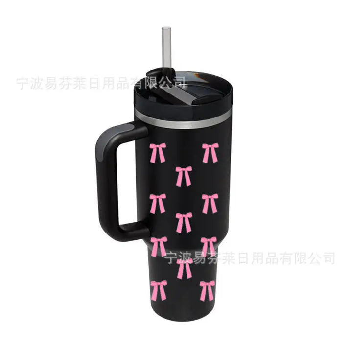 Black tumbler with pink bows.