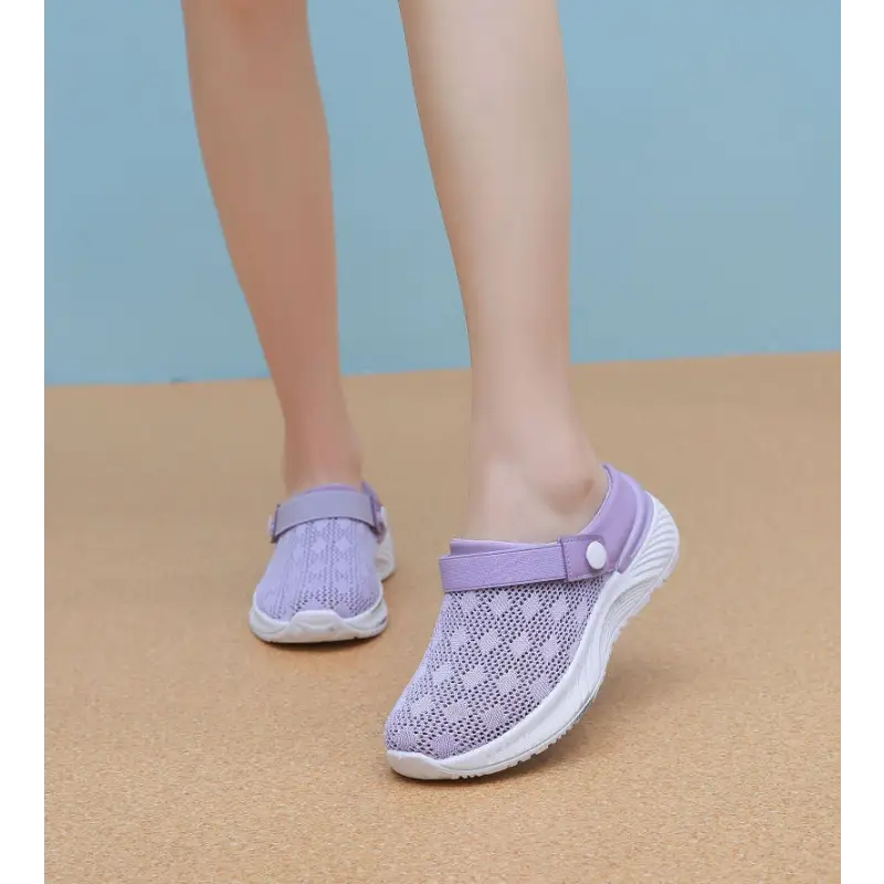 Lavender mesh clog shoes.
