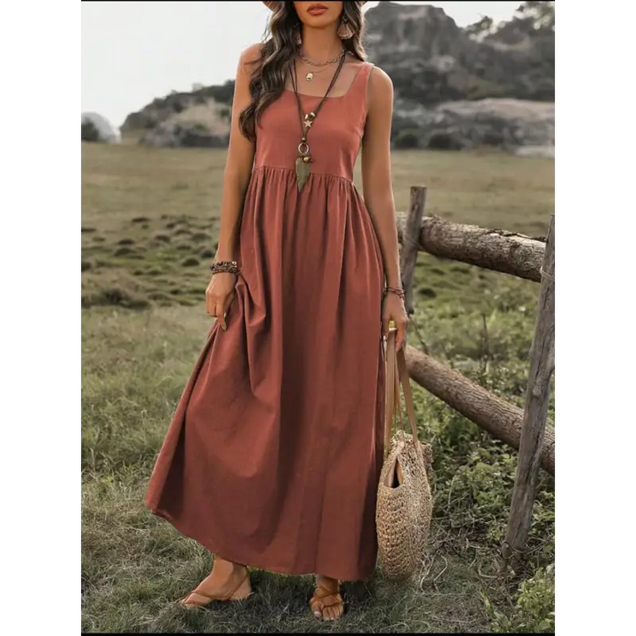Rust-colored sleeveless maxi dress.