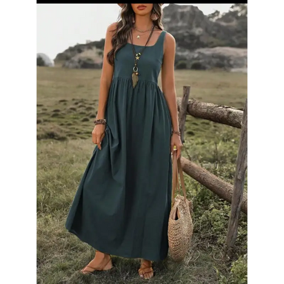 Woman’s green maxi dress.