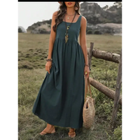 Woman’s green maxi dress.