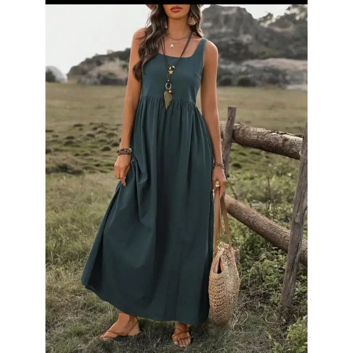 Woman’s green maxi dress.