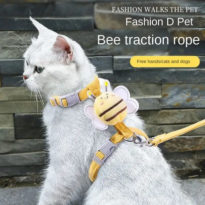 Cat wearing a bee-themed harness.