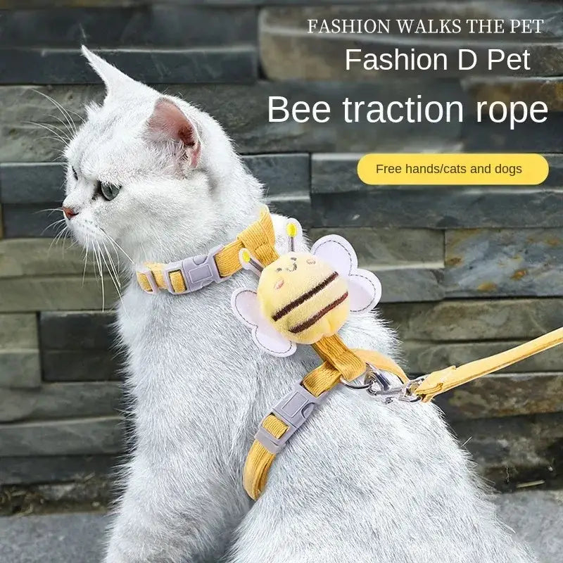Cat wearing a bee-themed harness.