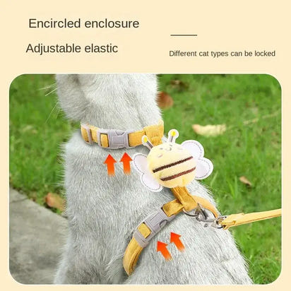 Yellow cat harness with bee decoration.