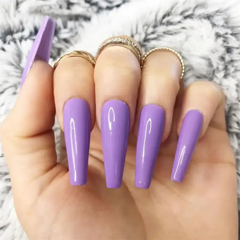 Lavender coffin-shaped nails.
