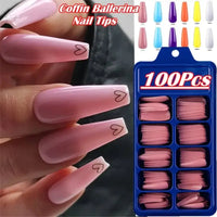 Pink coffin ballerina nail tips.