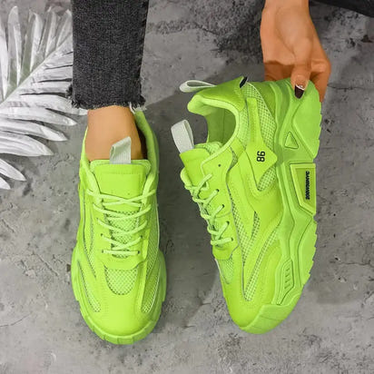 Neon green chunky sneakers.