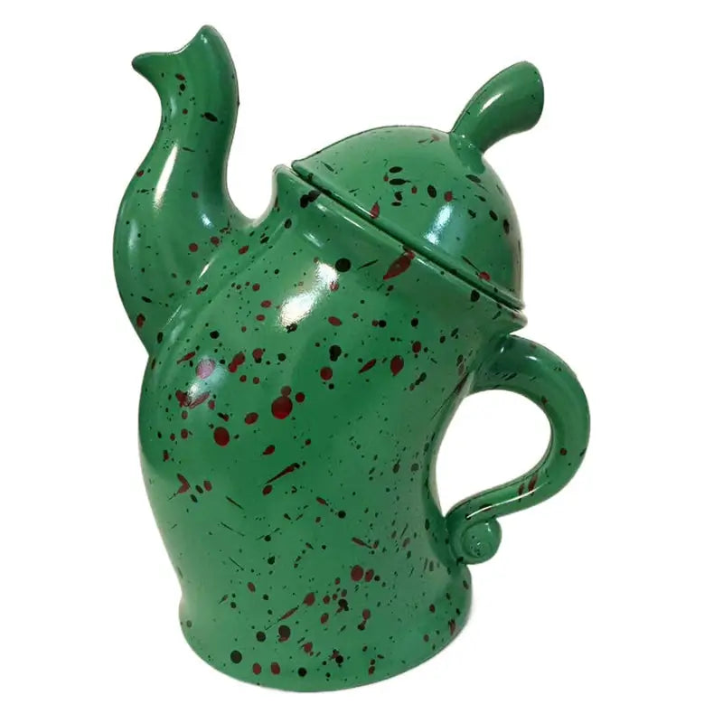 Green teapot with red speckles.