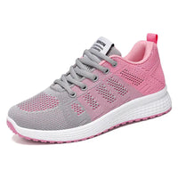 Pink and gray mesh running shoe.