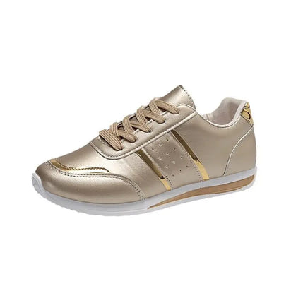 Gold-colored fashion sneaker.