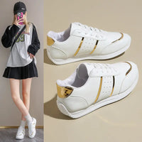 White sneakers with gold accents.