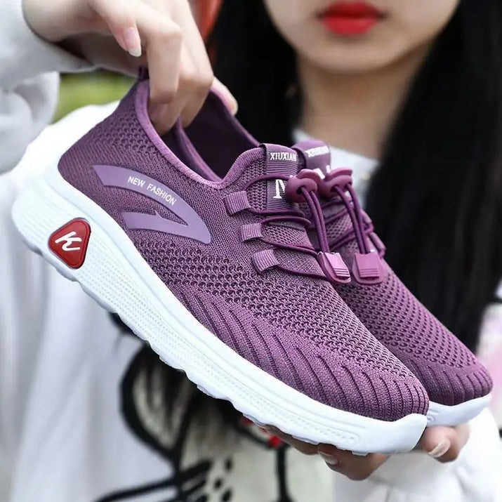 Purple knit athletic shoes.